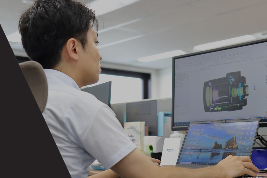 An engineer designing precision optical equipment